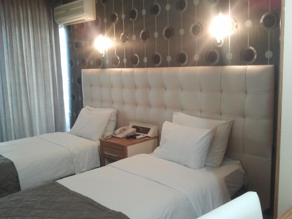 Hotel Kocaman Измир Номер фото