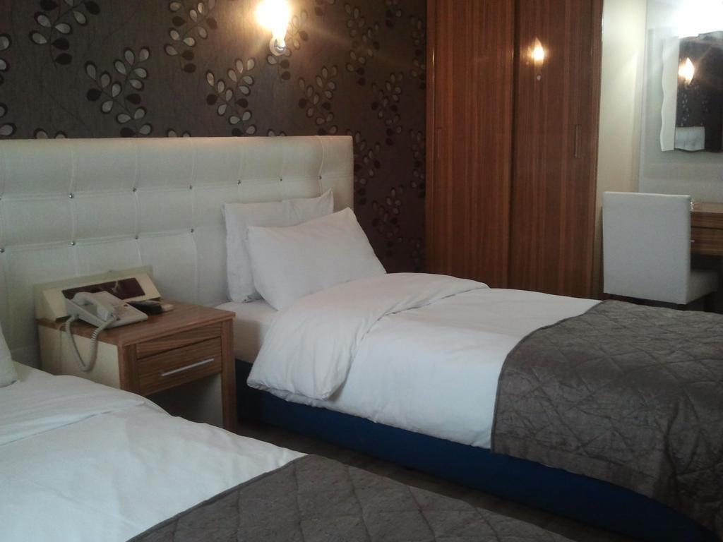 Hotel Kocaman Измир Номер фото